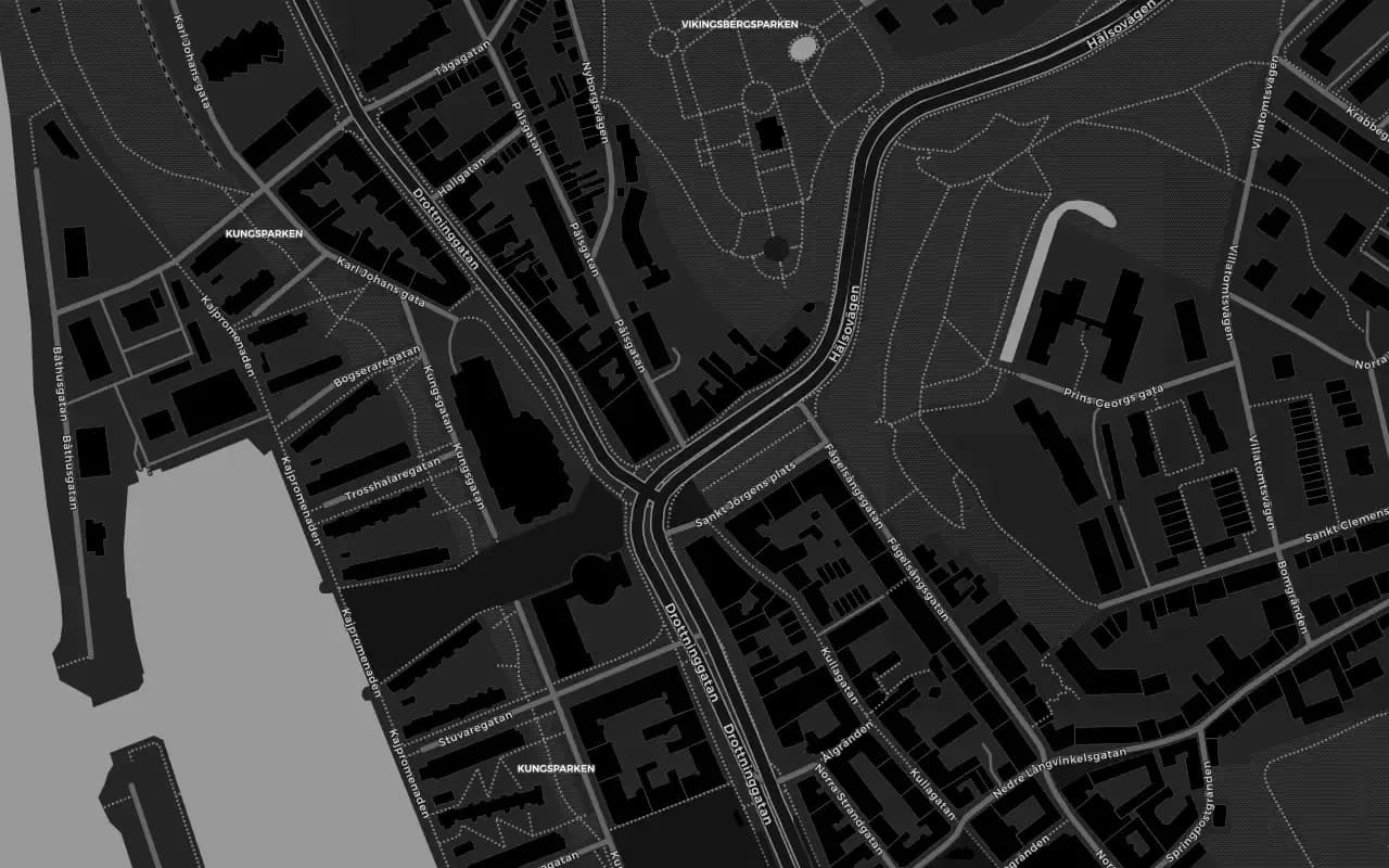 Mörk karta över kvarteren kring Hälsovägen 5 i Helsingborg, med hamnen i väster och Kungsparken i norr. Woofadez är markerad i mitten.